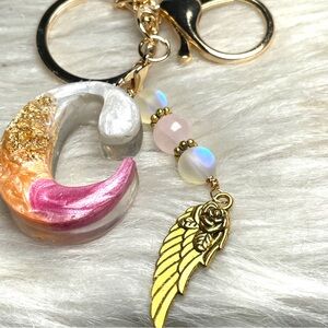 Custom Orange and Pink Letter “C”Keychain with Rose Quartz and Gold Wing Charm